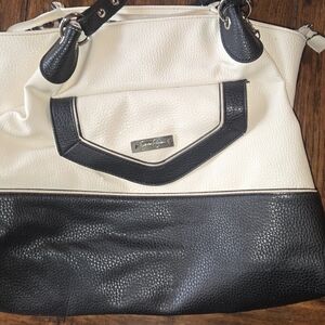 Jessica Simpson, white and black purse.